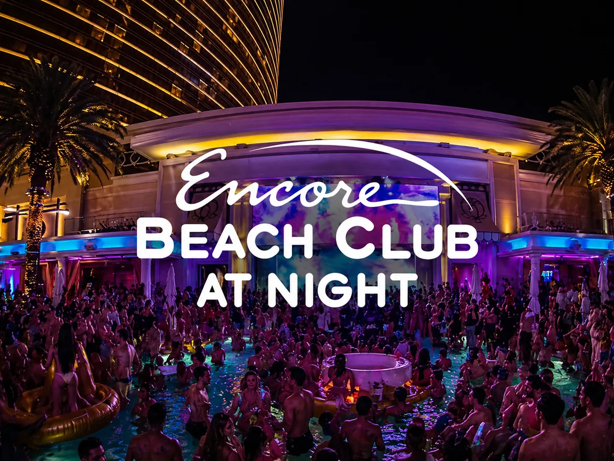Encore Beach at Night at Wynn Las Vegas with illuminated pool crowd and after-dark atmosphere.